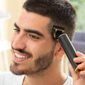 Máquina de Cortar Cabelo Profissional Recarregável InnovaGoods Triher com Acessórios